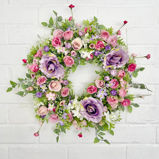 Huge Flower Door wreath with artificial flowers. Pink and purple roses and blossom