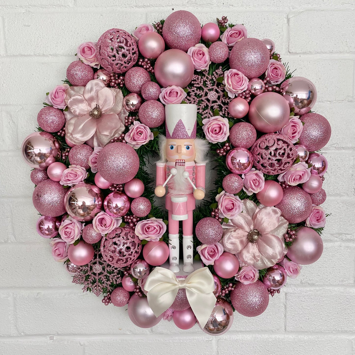 Huge pink Christmas wreath with big pink nutcracker soldier