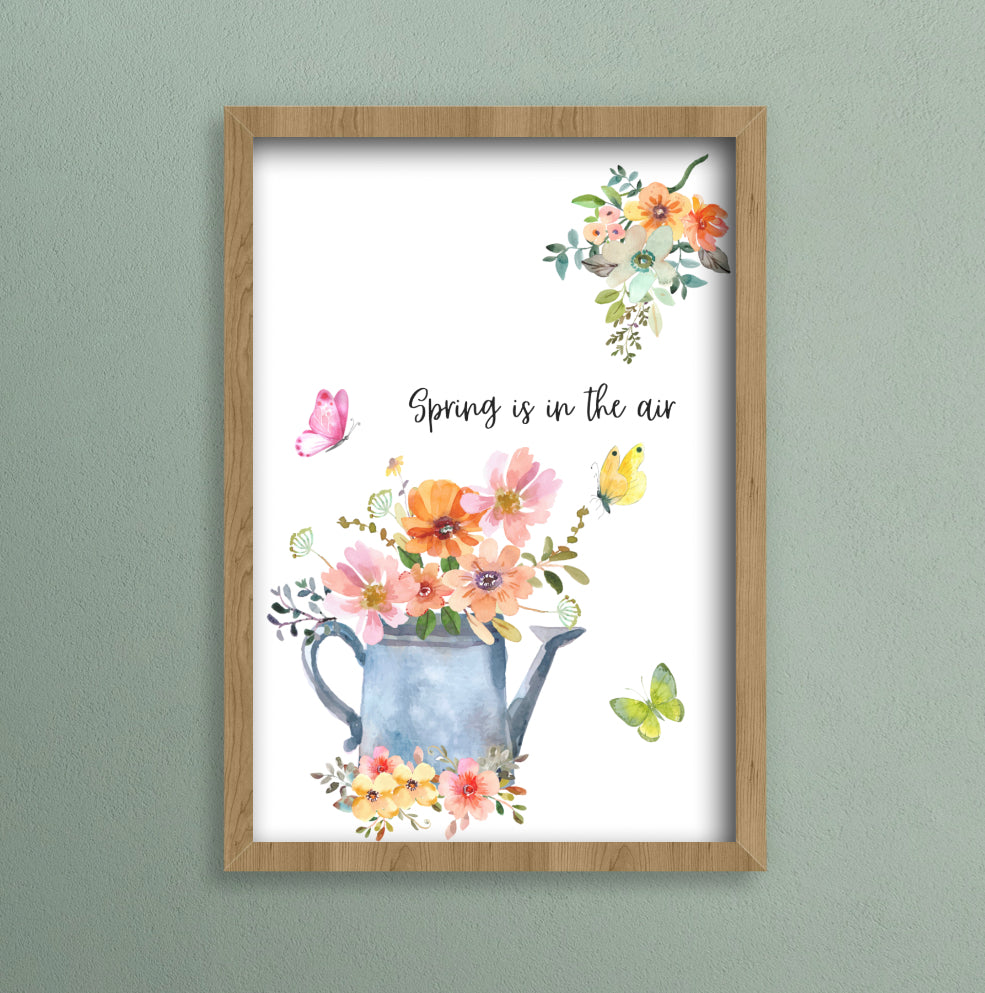 Watercolour a4 print of a watering can with flowers and text that says spring is in the air