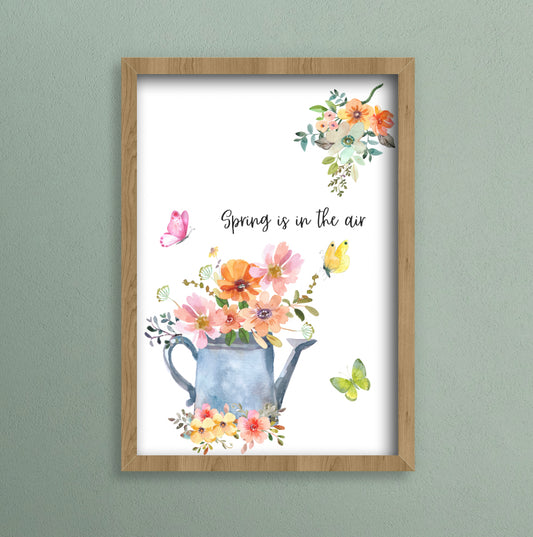 Watercolour a4 print of a watering can with flowers and text that says spring is in the air