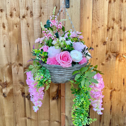 Garden hanging basket created with artificial flowers